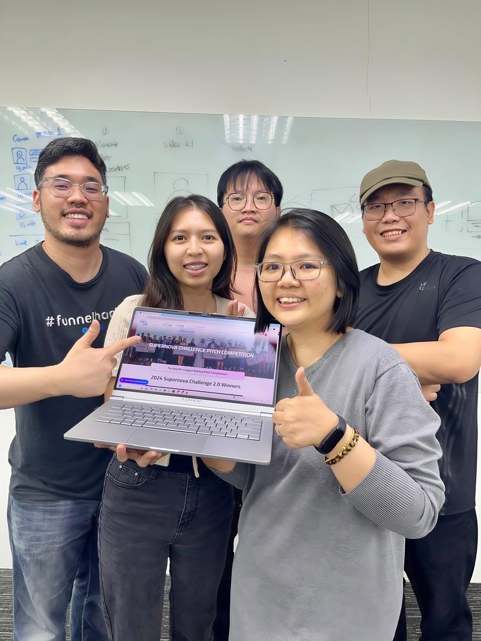 The team celebrating the Supernova Challenge win